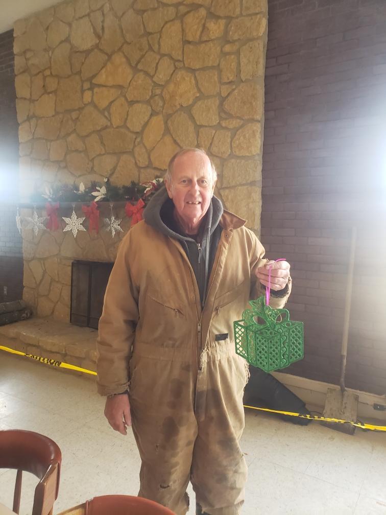 Allen Hackleman with Christmas ornament